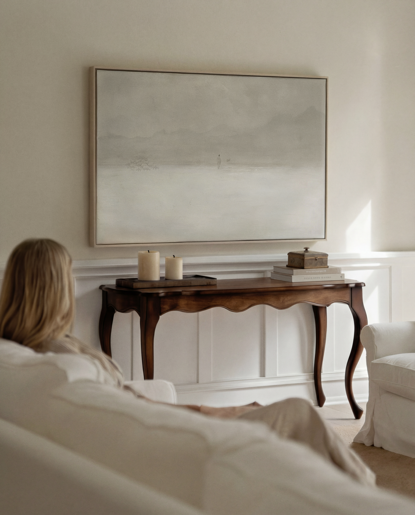 Jesus Leaves the 99 canvas painting hung above a neutral modern console — living room faith art — Christian Modern